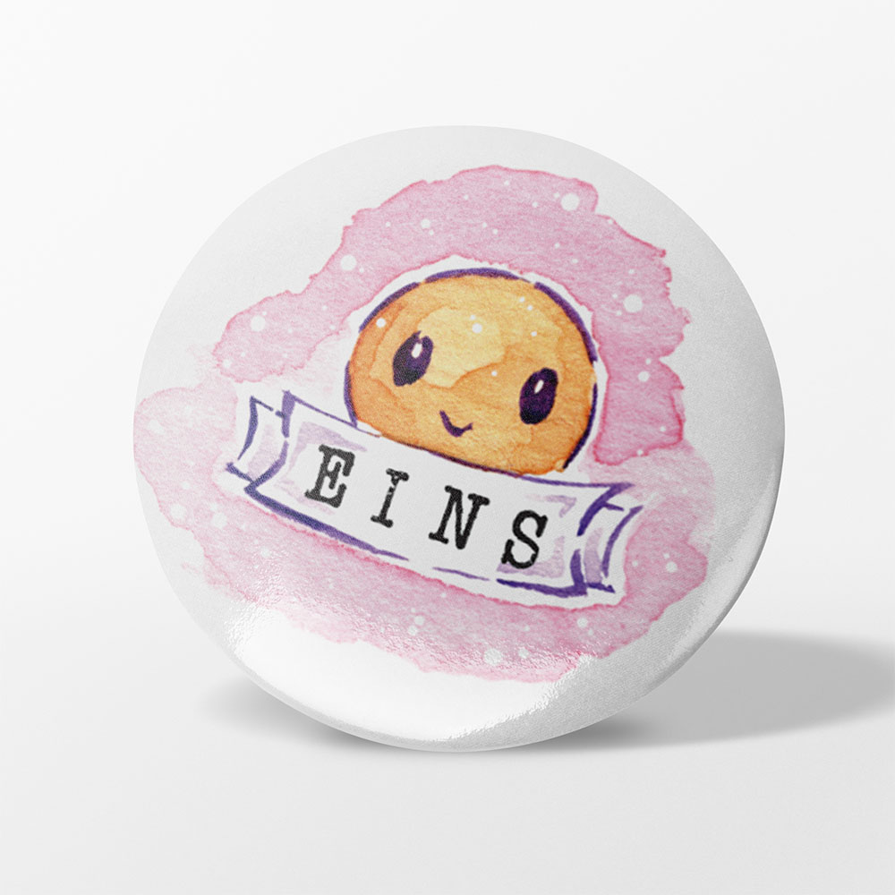 Button Pins mit Adventskalender Zahlen und Zeichnungen